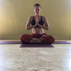Andrea Leplae in seated yoga pose